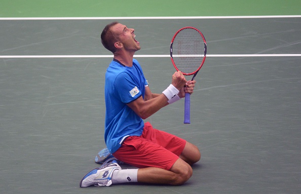 Lukas Rosol celebrates victory over Jo-Wilfried Tsonga (Photo: Michal Cizek/Getty Images)