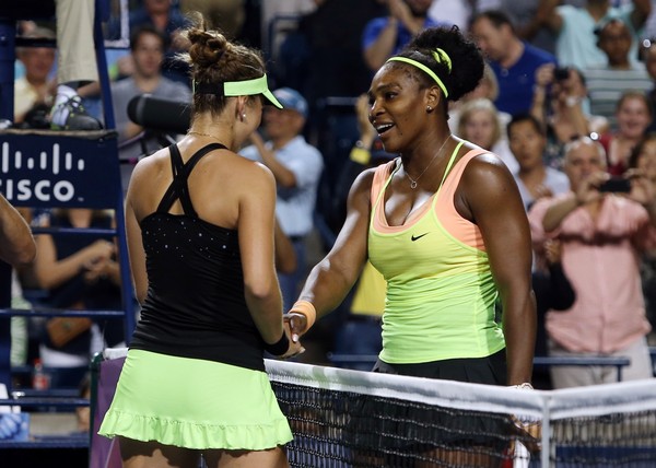 Serena Williams congratulates Belinda Bencic after their semifinal match at the 2015 Rogers Cup presented by National Bank. | Photo: Vaughn Ridley/Getty Images