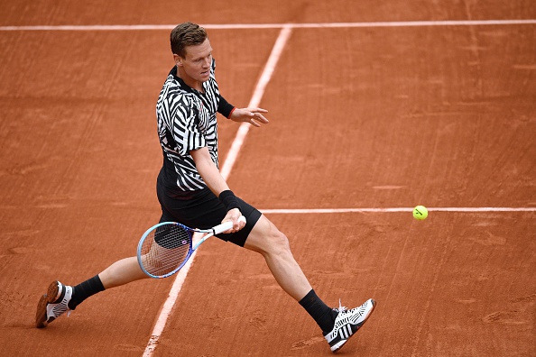 Tomas Berdych steps into a forehand during the quarterfinal. Photo: Martin Bureau/AFP/Getty Images