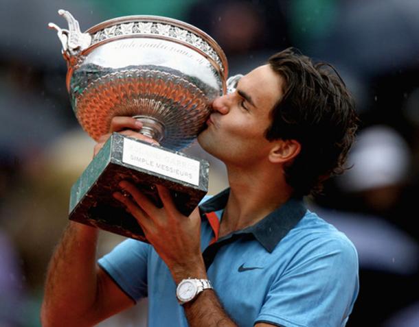 Federer rejoices after claiming his first French Open title in 2009. Credit: Bertrand Guay/Getty Images