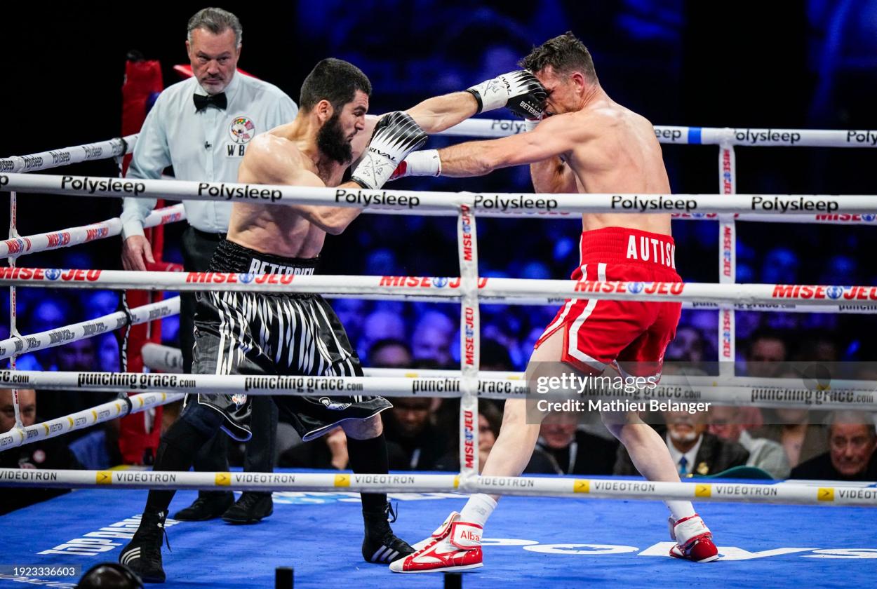 QUEBEC CITY, CANADA - JANUARY 13: Artur Beterbiev of Canada punches <strong><a  data-cke-saved-href='https://www.vavel.com/en/more-sport/2020/11/17/1047241-saul-canelo-alverez-returns-against-callum-smith-december-19th.html' href='https://www.vavel.com/en/more-sport/2020/11/17/1047241-saul-canelo-alverez-returns-against-callum-smith-december-19th.html'>Callum Smith</a></strong> of the United Kingdom during their WBC, IBF and WBO light-heavyweight world championship fight at Videotron Centre on January 13, 2024 in Quebec City, Canada. (Photo by Mathieu Belanger/Getty Images)