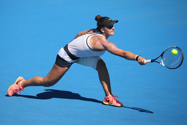 Bianca Vanessa Andreescu lunges for a defensive backhand shot during her semifinal match against Rebeka Masarova at the 2017 Australian Open Junior Championships. | Photo: Pat Scala/Getty Images