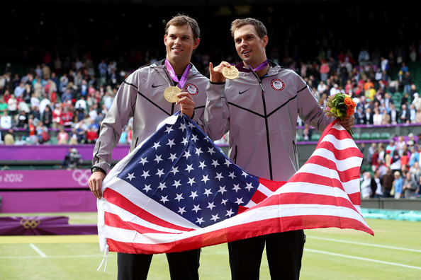 Bob and Mike Bryan pose with their gold medals after the men's doubles prize ceremony at the 2012 London Olympics.