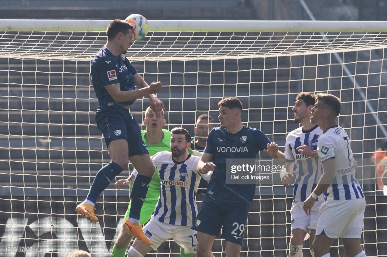 Keven Schlotterbeck rises highest to equalise for Bochum and give them a chance of survival PHOTO CREDIT: DeFodi Images