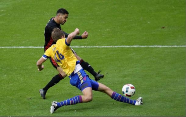 Colorado Rapids center back Axel Sjoberg (in yellow, sliding) has been a rock at the back for the Rapids this season. Photo credit: Rob Carr/Getty Images Sport