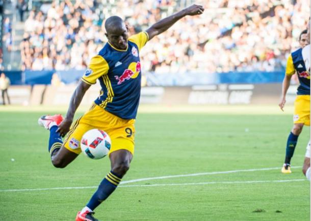 New York Red Bulls forward Bradley Wright-Phillips (center, #99, in blue) has scored seven goals in his last six matches. Photo credit: Tim Clayton/Getty Images Sport