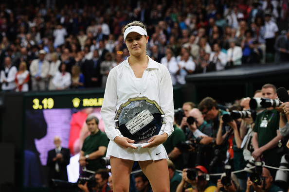 Bouchard holds her runner-up trophy after the 2014 final. Photo: Getty Images