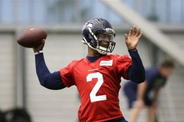 Seattle Seahawks quarterback Trevone Boykin throws a pass during practice. Image via AP. 