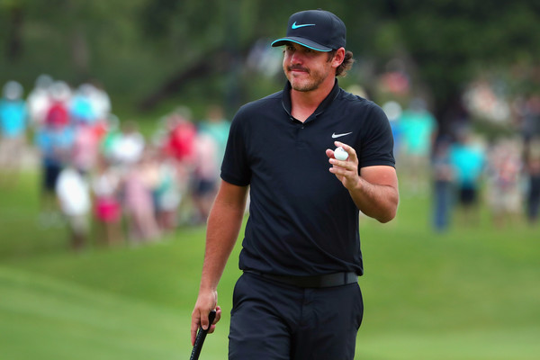 Brooks Koepka smiles for the camera during his third round in Dallas. Photo: Tom Pennington/Getty Images