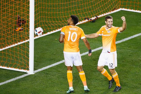 Giles Barnes (left) and Will Bruin (right) of the Houston Dynamo celebrate a first-half own goal against FC Dallas during their game at BBVA Compass Stadium on March 12, 2016 in Houston, Texas / Scott Halleran - Getty Images