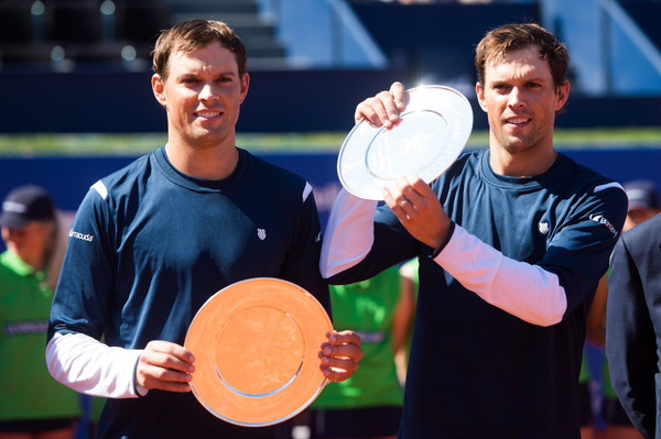 Bob (left) and Mike Bryan hold their trophies after winning Barcelona in April. Photo: Alex Caparros/Getty Images