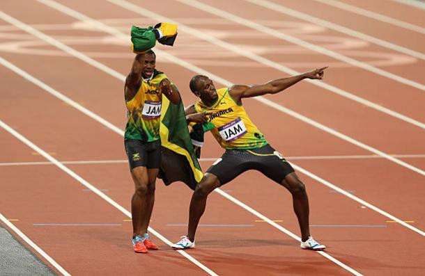 Boldon has picked Yohan Blake, pictured with his training partner Bolt, to be the main threat to Bolt in London (Getty Classic/Bryn Lennon)