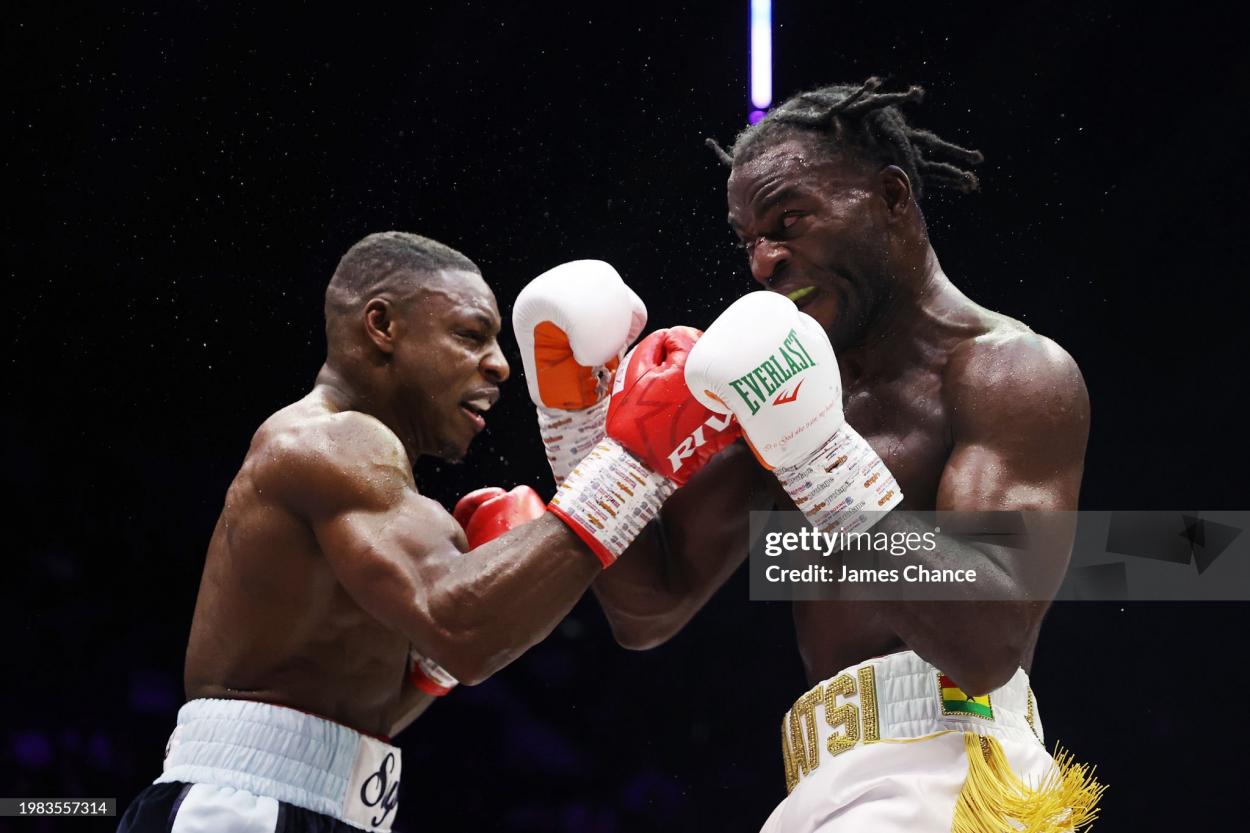 LONDON, ENGLAND - FEBRUARY 03: Joshua Buatsi and Dan Azeez exchange punches during the British and Commonwealth Light Heavyweight title fight between Dan Azeez and Joshua Buatsi at OVO Arena Wembley on February 03, 2024 in London, England. (Photo by James Chance/Getty Images)