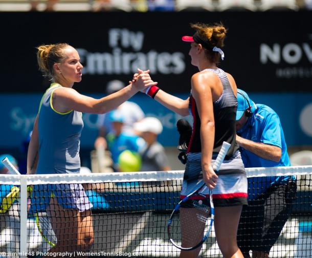 Kuznetsova and Begu meet at the net after the match | Photo: Jimmie48 Photography