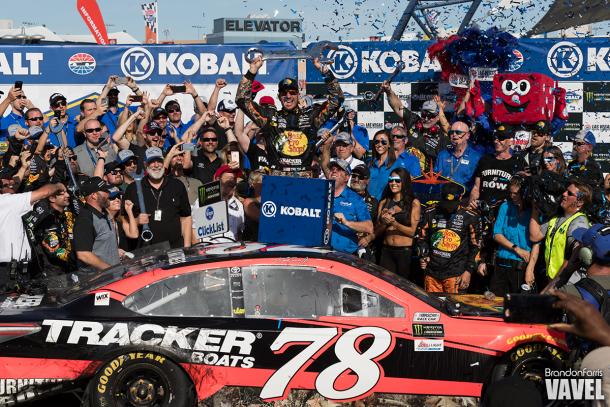 Truex Jr. celebrates in victory lane.