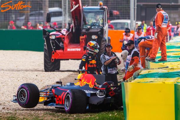 Ricciardo walks away from his damaged Red Bull. Photo: Sutton Images