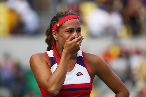 Monica Puig looks in disbelief after upsetting Petra Kvitova to reach the Olympic final (Getty/Clive Brunskill)