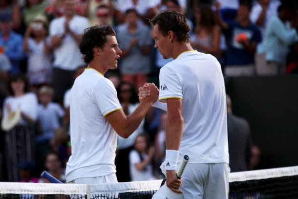 Dominic Thiem and Tomas Berdych meet at the net following their match (Getty/Clive Brunskill)