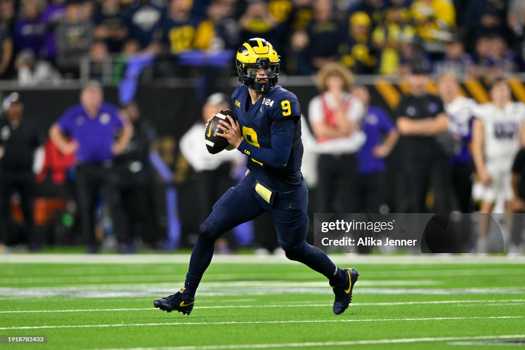 J.J. McCarthy #9 of the Michigan Wolverines rolls out of the pocket during the fourth quarter 2024 CFP National Championship game against the Washington Huskies at NRG Stadium on January 08, 2024 in Houston, Texas. The Michigan Wolverines won 34-13. (Photo by Alika Jenner/Getty Images)