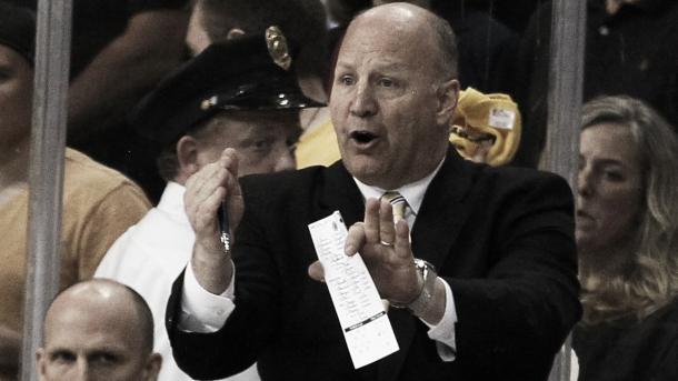 Claude Julien behind the Boston Bruins bench. (Bruce Bennett/Getty Images)