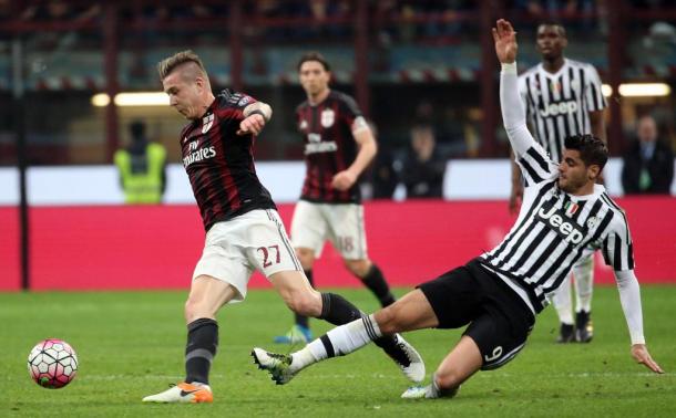 Morata entra in scivolata su Kucka. Fonte: Ansa.