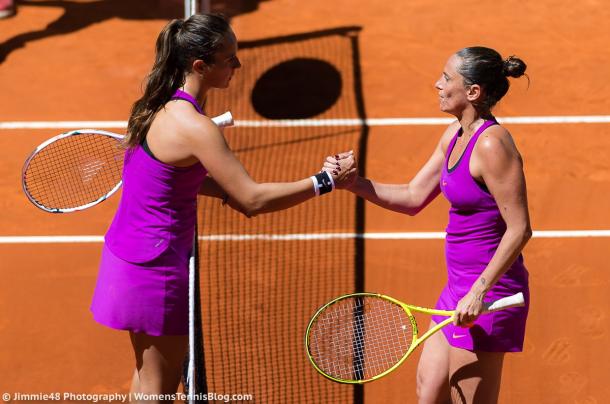 Daria Kasatkina and Roberta Vinci meet at the net after their meeting in Madrid earlier this year, in which Vinci triumphed in three sets | Photo: Jimmie48 Tennis Photography