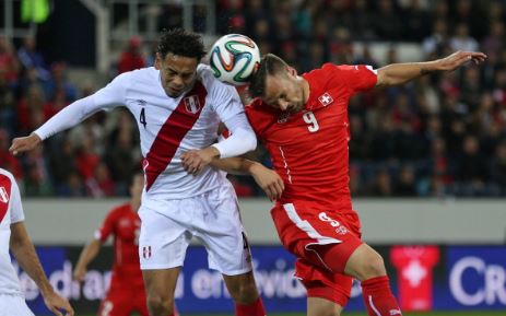 Alexander Callens (left) during an international friendly in 2014 against Switzerland | Source: Philipp Schmidli - Bongarts/Getty Images