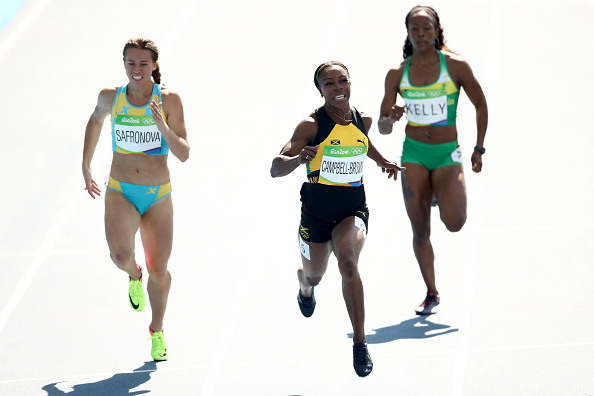 Veronica Campbell Brown cuts into the wrong lane in the heats of 200-meters (Getty/Cameron Spencer)