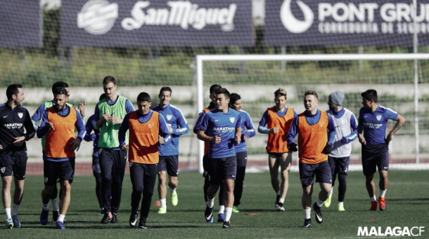Fuente: Málaga CF | El equipo corre en un entrenamiento semanal