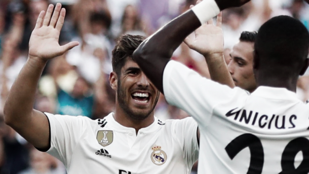 Asensio celebra su gol con Vinicius. Foto: Real Madrid.