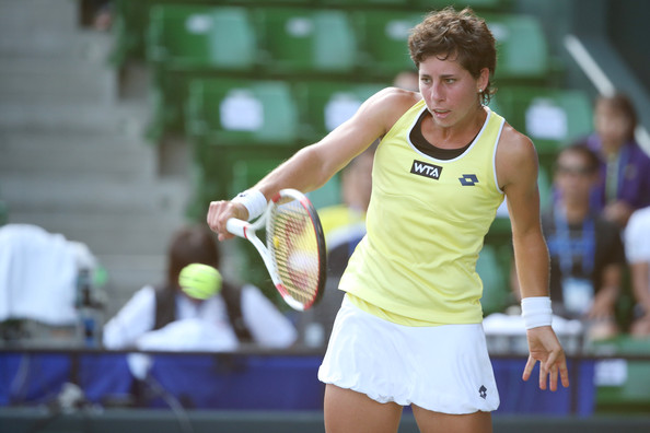Carla Suarez Navarro strikes a backhand at the 2014 Toray Pan Pacific Open in Tokyo/Getty Images