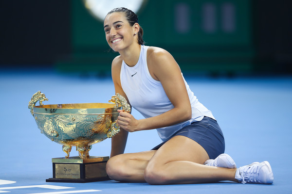 Caroline Garcia proudly poses along with her China Open trophy, a triumph which pushed her into the top-10 | Photo: Lintao Zhang/Getty Images AsiaPac