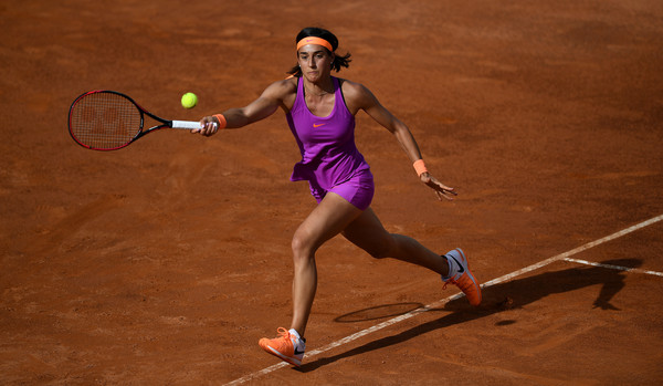 Caroline Garcia runs to hit a forehand at the Internazionali BNL D'Italia | Photo: Gareth Copley/Getty Images Europe