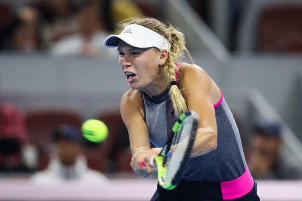 Caroline Wozniacki in action | Photo: Lintao Zhang/Getty Images AsiaPac