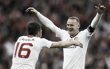 Wayne Rooney and Michael Carrick celebrate winning their first FA Cup trophy - Picture: Getty