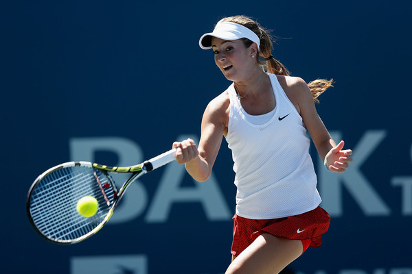 Catherine Bellis hitting a forehand | Photo: Lachlan Cunningham/Getty Images North America