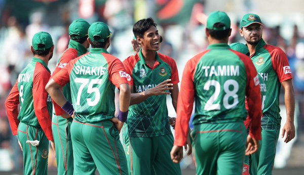 Mustafiqur celebrates with his teammates during his five wicket haul | Photo: icc.com