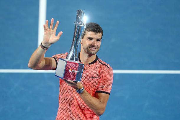 Dimitrov with the title in Brisbane (Getty/Chris Hyde)