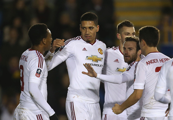 Chris Smalling celebrates a scruffy opener | Photo: John Peters/Manchester United