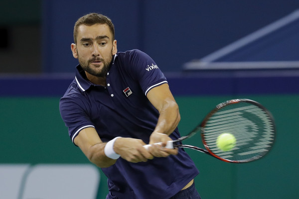 Marin Cilic crushes a backhand in Shanghai. Photo: Lintao Zhang/Getty Images