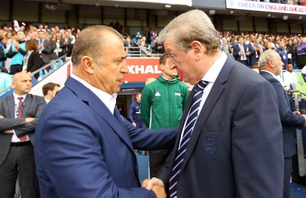 Fatih Terim (L) greets England head coach Roy Hodgson | Photo: Milli Takimlar