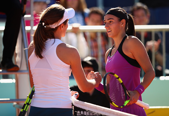 Caroline Garcia talks to Johanna Konta after the Brit retired in Madrid (Getty/Clive Brunskill)