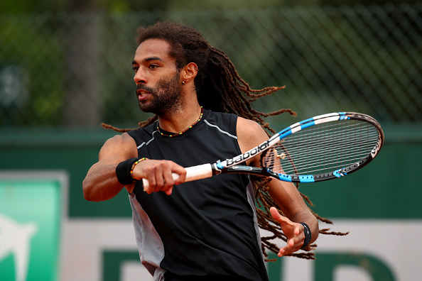 Dustin Brown in action during his first round win against Dudi Sela at the French Open (Getty/Clive Brunskill)