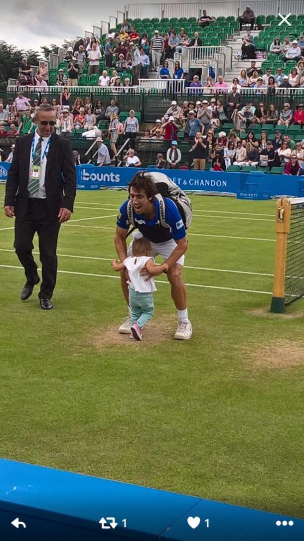 Cuevas shares a special moment with his daughter after victory. Photo: Getty