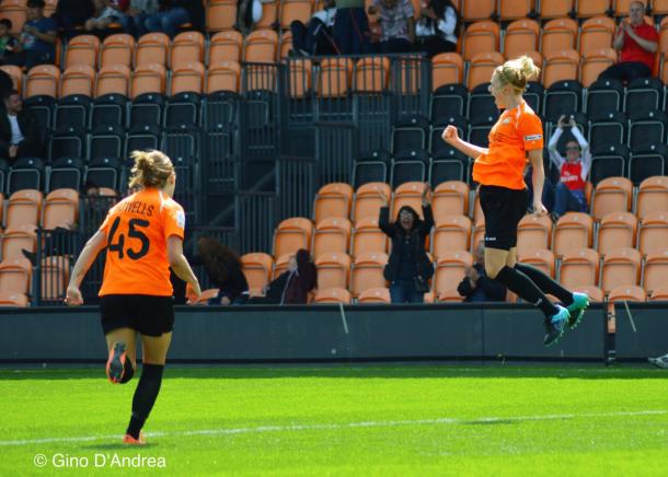 Jo Wilson celebrates giving the London Bees the lead against Chelsea in a Conti Cup game - the Bees went on to win the tie on penalties (Credit: Gino D'Andrea)
