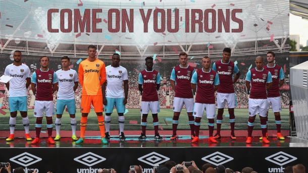 Above: Michail Antonio and other West Ham United players unveiling the club's new kits | Photo: whufc.com