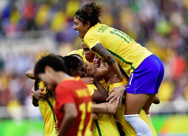 Brazil celebrate Monica's header. (Photo: FIFA)