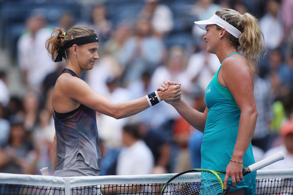 Coco Vandeweghe had a warm embrace with Lucie Safarova at the net after their meeting | Photo: Matthew Stockman/Getty Images North America