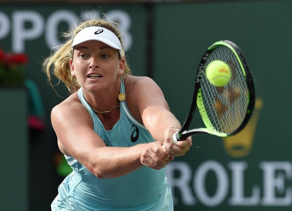 Coco Vandeweghe reaches out for a backhand return | Photo: Kevork Djansezian/Getty Images North America