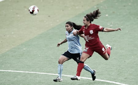 Colaprico (right) wins a header in a W-League game | Source: Matt King - Getty Images